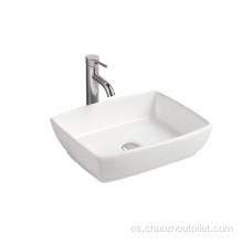 Lavabo de cerámica para dos habitaciones en color blanco con grifo monomando